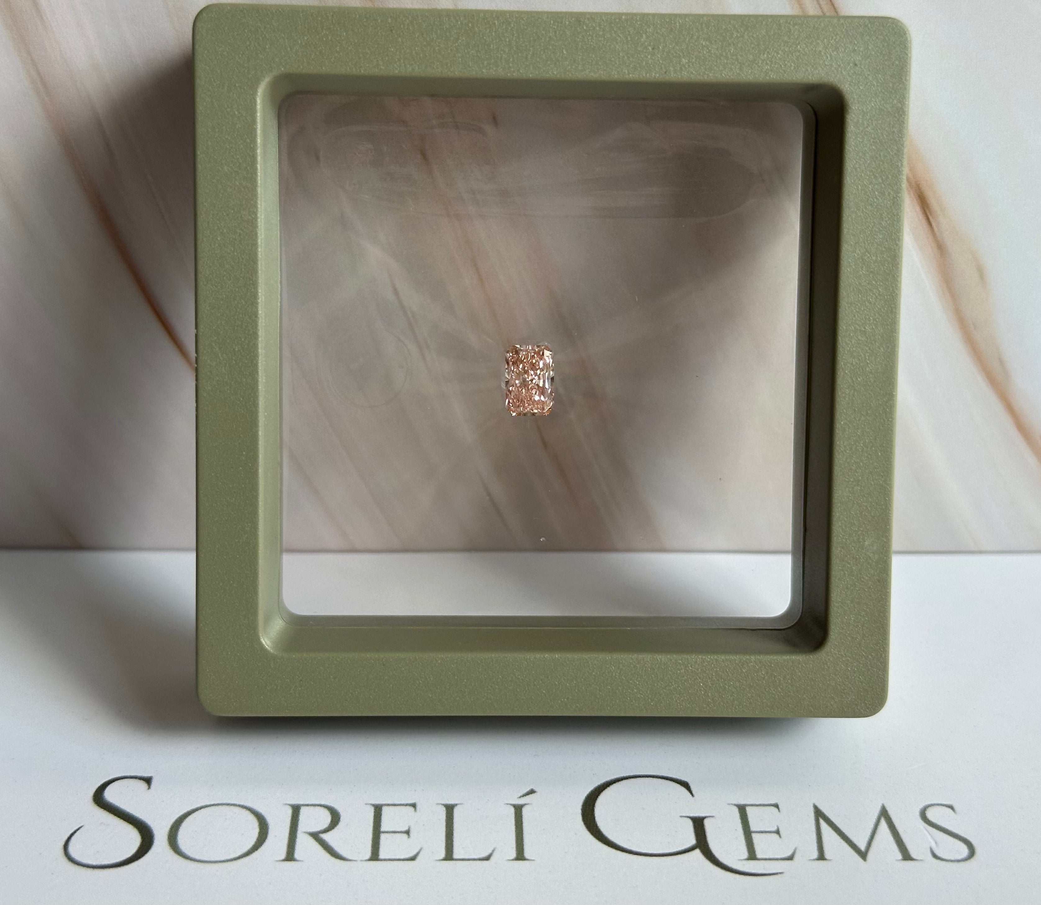 1.05 ct Radiant - Fancy Intense Pink (VS1)